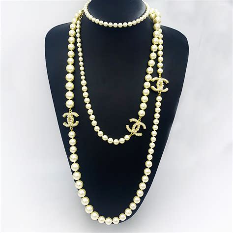 chanel double cc logo pearl necklace|chanel long necklace with pearls.